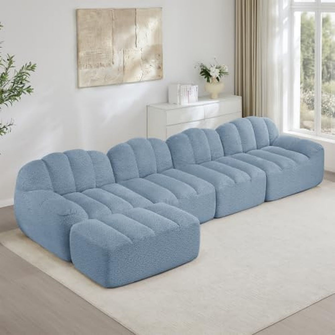 Divano confortevole modulare con poggiapiedi blu